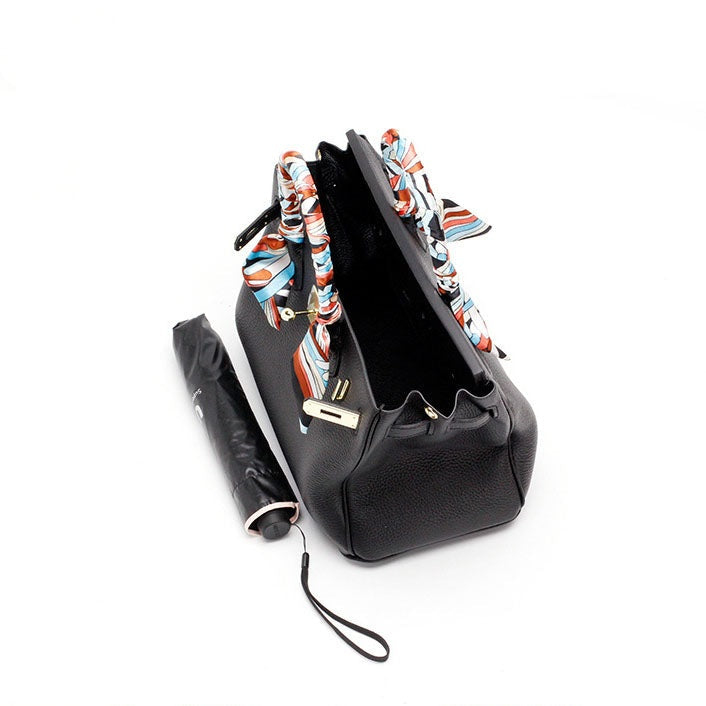 Cayetana · Bolso de mano de piel con asas dobles