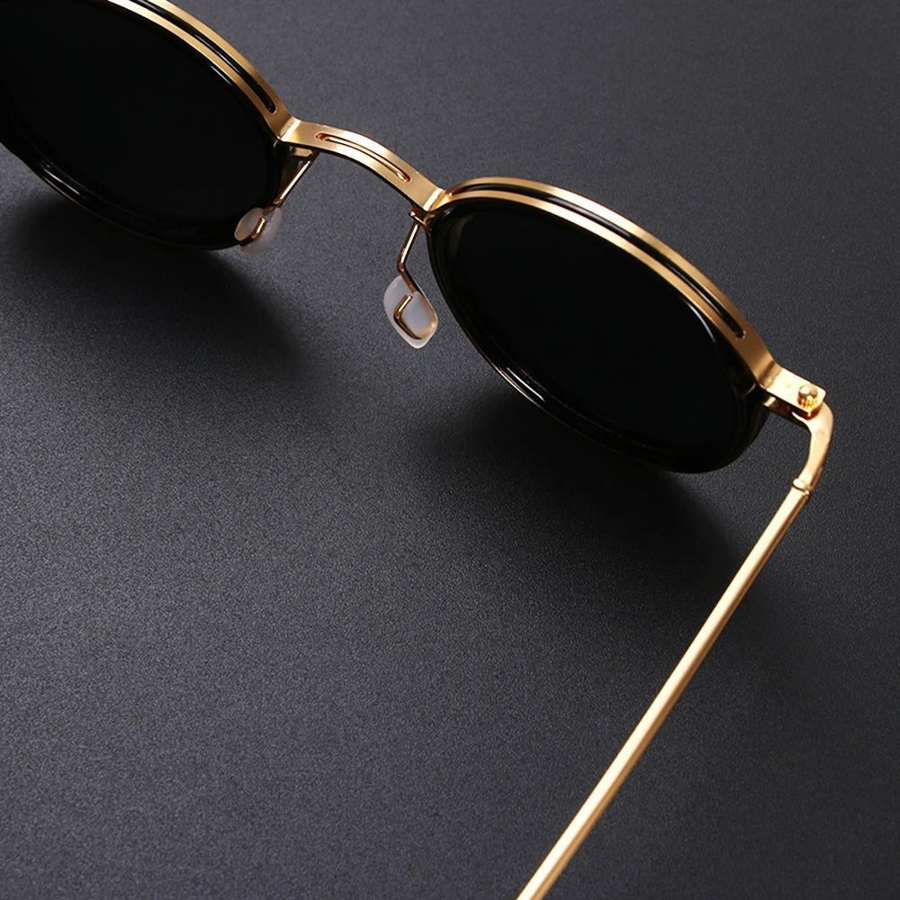 Leticia · Gafas de sol redondas con patillas doradas