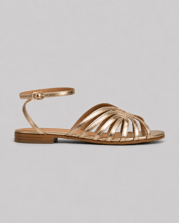 Sandalias doradas con detalles joya